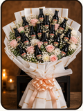 Promotional product graphic for a 'Baileys Cream Royale' gift set by Drapednuts. The image features a bouquet of 15 mini Baileys bottles wrapped in elegant white and pink ribbon, set against a dark background.